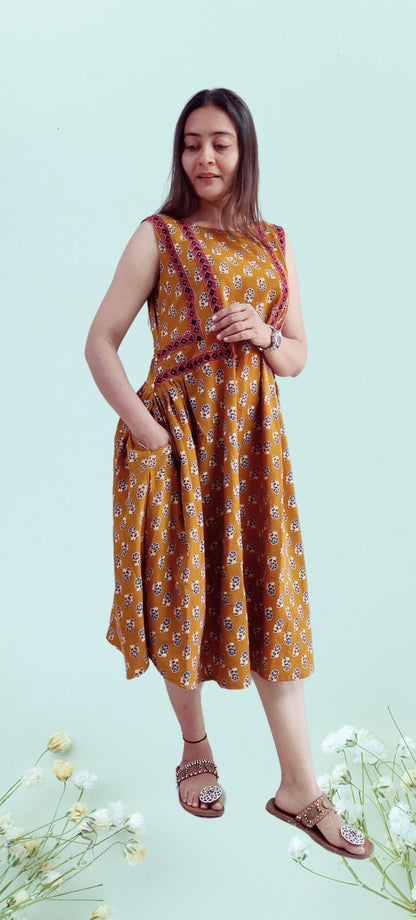 "ANERI" Mustard yellow mirror work frock style kurti