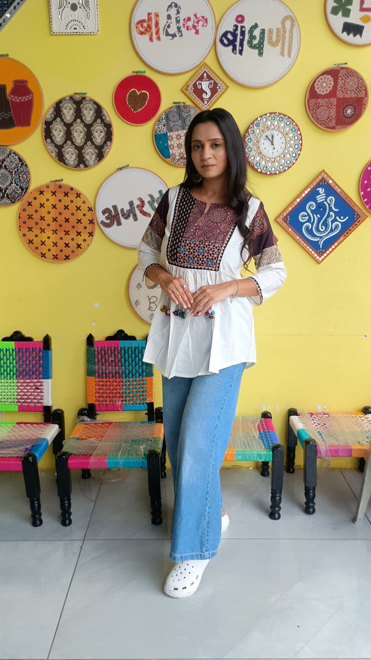"Rishika" white Plain cotton short top with tassels.